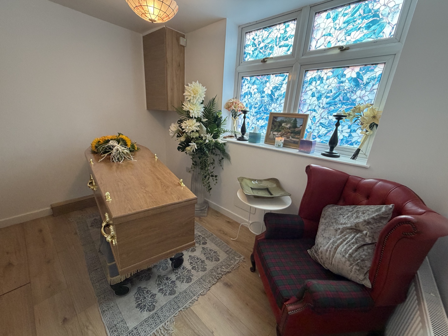 Bay Tree Funerals’ private Chapel of Rest in Blaby, with a comfortable chair, flowers and soft natural light